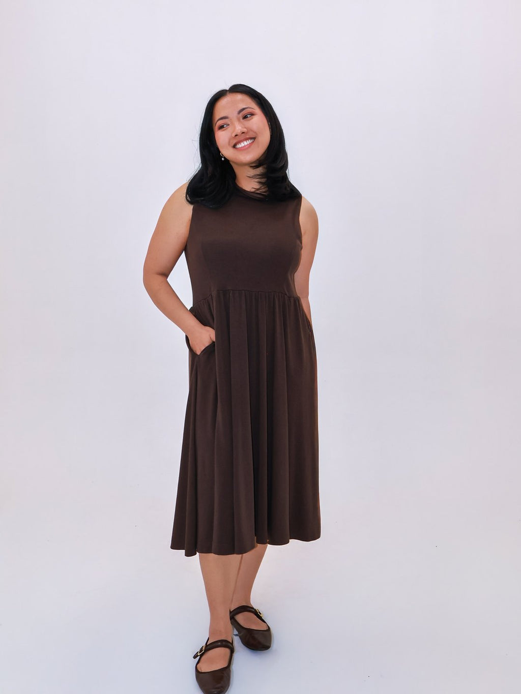 Petite Maternity & Breastfeeding Dress in Dark Chocolate with a hand in the side pocket